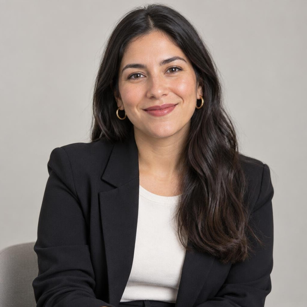 Studio portrait of a Chilean woman in her 30s smiling